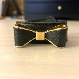 Cute black with gold trim bow bracelet!